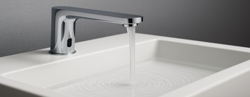 Touchless faucets and soap dispensers at a shared office lavatory
