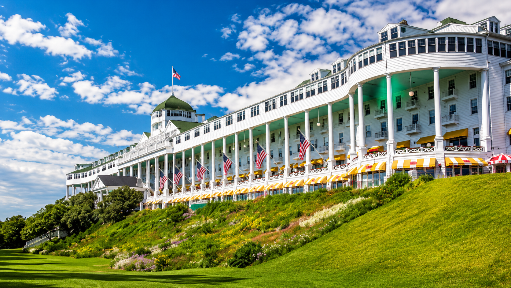 Mackinac Island horse carriage guest arrival and historic resort restroom fixture planning